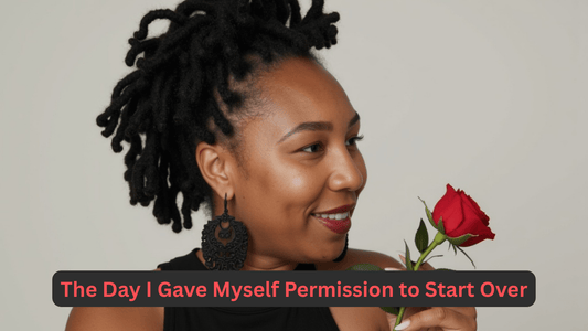 Woman with natural hair holding a red rose, symbolizing a fresh start and personal empowerment.