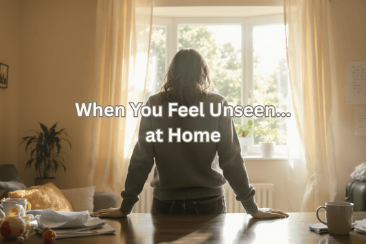 Mom standing alone at home in a quiet moment, reflecting on emotional labor and feeling unseen at home as a mom