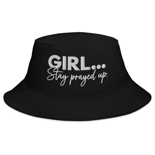 A Black embroidered bucket hat with GIRL... Stay Prayed Up script lettering
